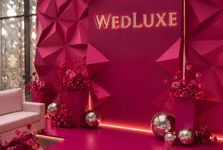 Magenta WEDLUXE backdrop with angular dimensional panels